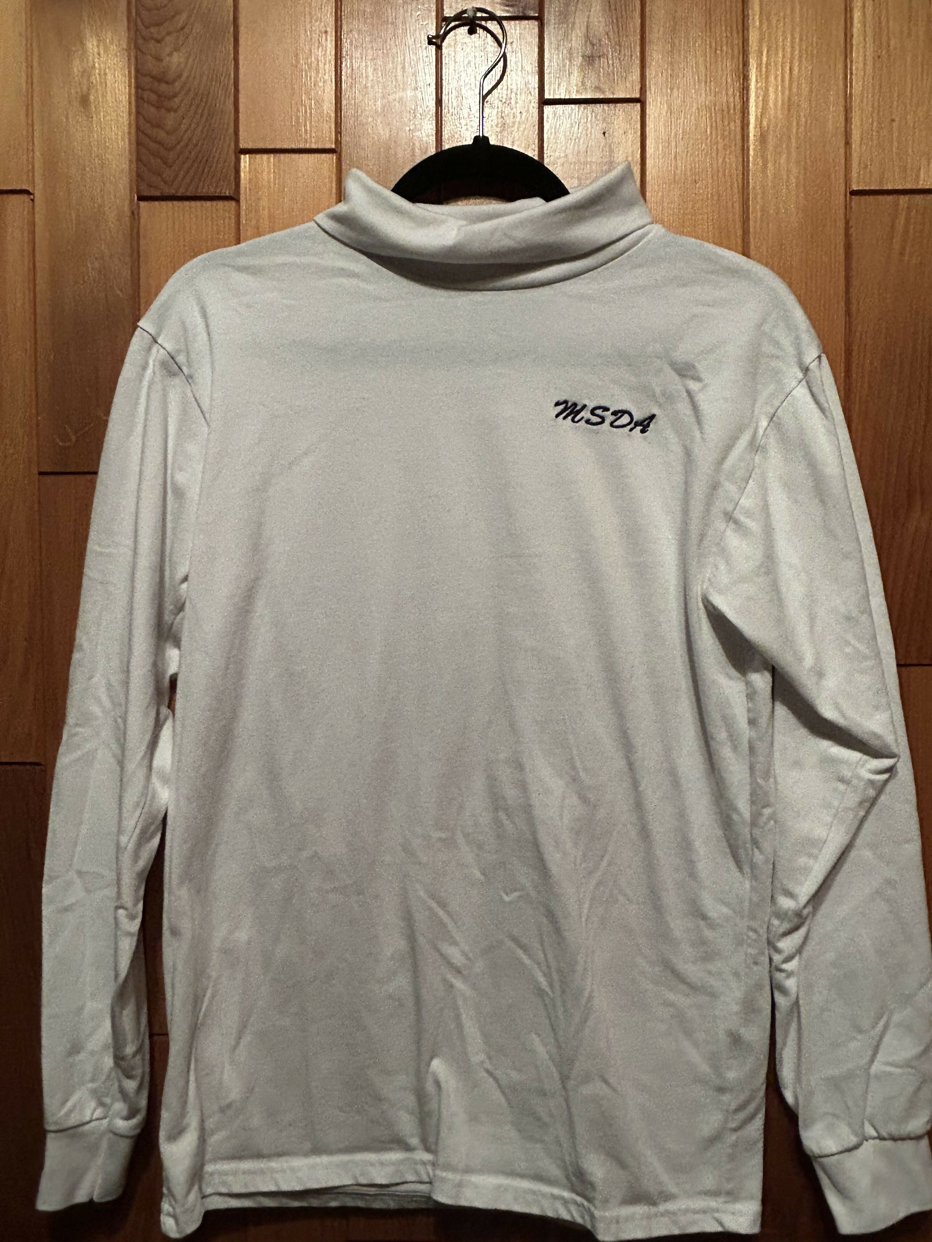 Turtleneck with embroidered logo
