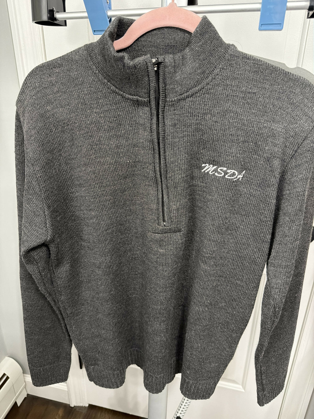 Quarter zip pullover sweater with logo