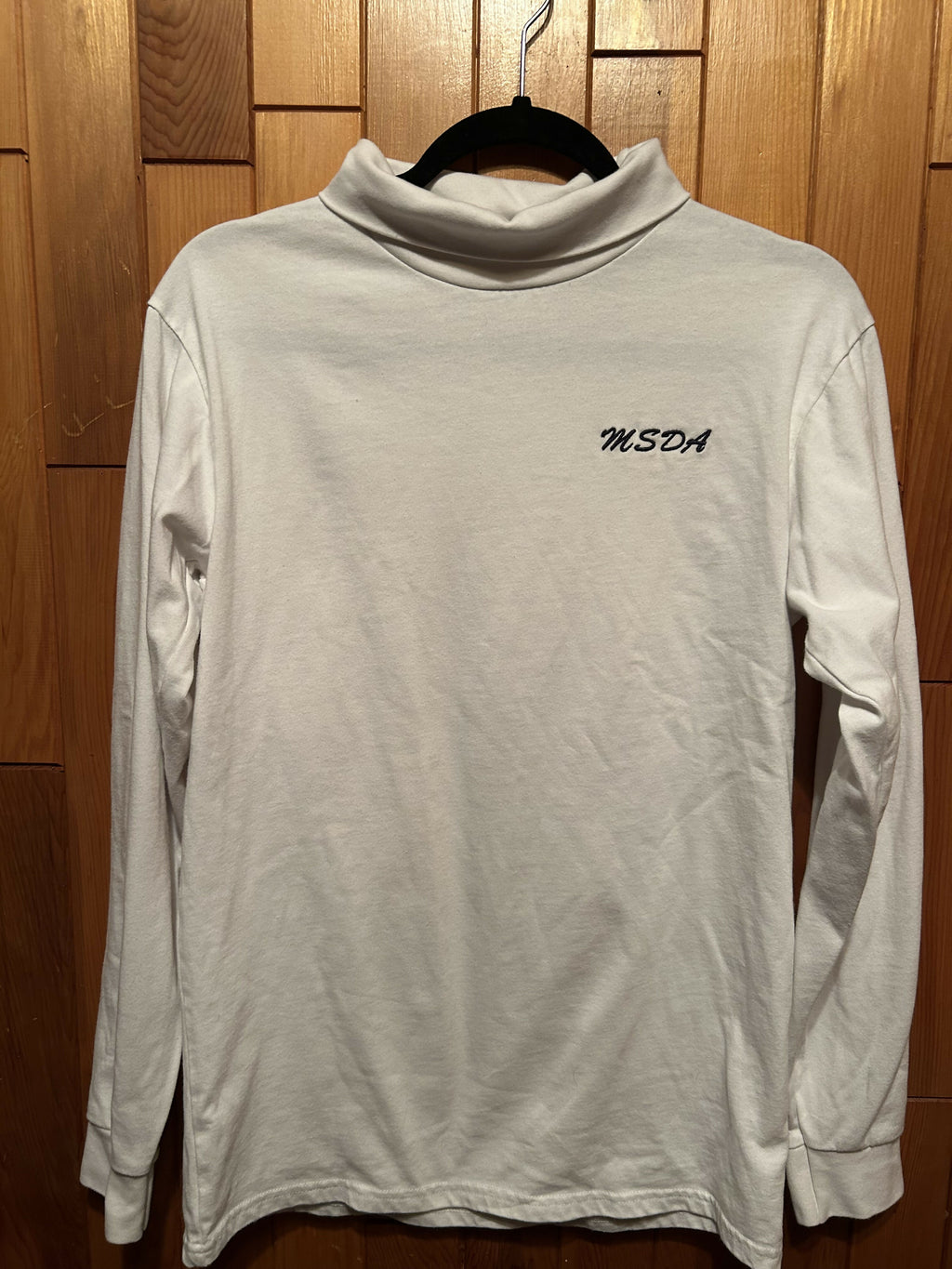 Turtleneck with embroidered logo